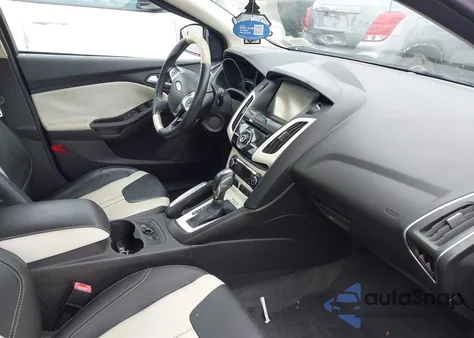 2012 Ford Focus Titanium z USA, uszkodzony, nr VIN 1FAHP3N24CL283473